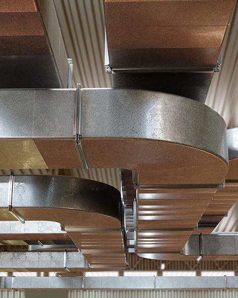 overhead view of industrial ductwork installation featuring various metallic ducts and ventilation components highlighting modern design and efficiency in a 12 duct system