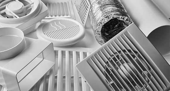 various white ventilation components including ducts fans and vents ideal for five essential HVAC parts